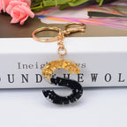 Carsine Black Pompom 26 Alphabets Keychain gold / S